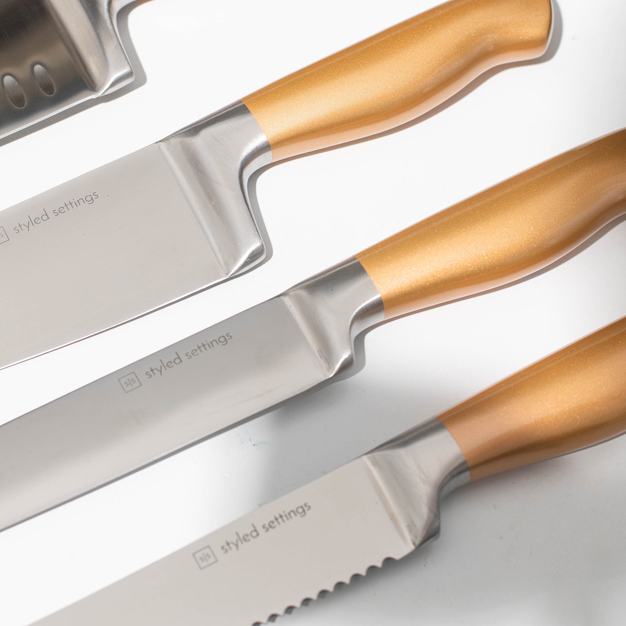 Gold and Silver Knife Set with Self-Sharpening Block - Styled Settings