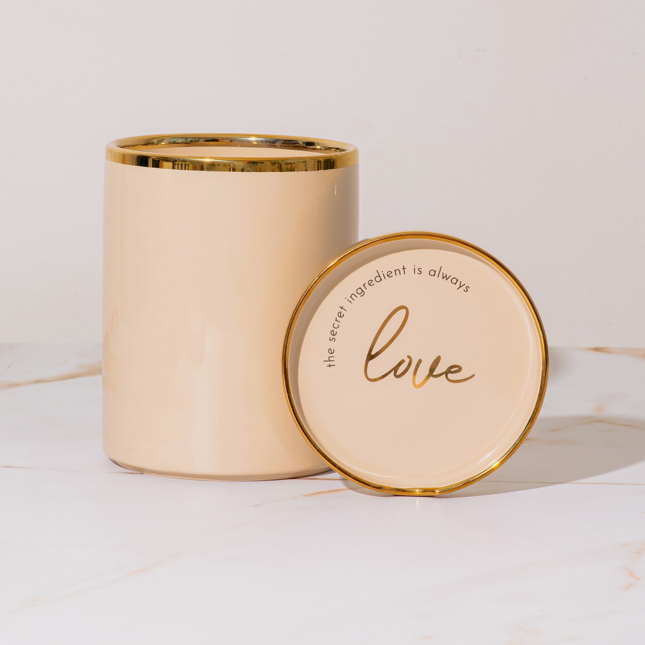 Beige and Gold Utensil Holder with Built-in Spoon Rest